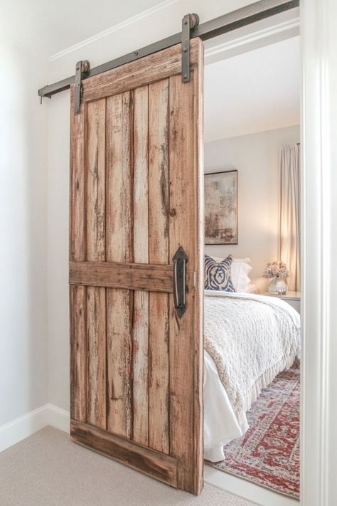 Elevate your bedroom with sliding barn doors for your closet. These rustic-chic doors add warmth and character while saving space. 🚪✨ #BarnDoors #RusticDecor #ElevatedCloset #BedroomStyle Mirror Barn Door Closet Master Bedrooms, Rustic Closet Door Ideas, Barn Bedroom Door, Farm Door Ideas, Bedroom Barn Door Ideas, Country Farmhouse Bedroom, Closet Barn Door, Barn Door Ideas, Rustic Closet