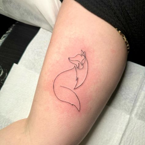 Foxy for @mrs.lws.20 🦊 Thank you again. 🥰 . . . #fox #foxtattoo #finelinefox #onelinefox #cutefoxtattoo #simplefoxtattoo #cutetattoo #femaninetattoo #delicatetattoo #linework #fineline #blackworkers #animaltattoo Fox One Line Tattoo, Fox Couple Tattoo, Single Line Fox Tattoo, Fox Tattoo Fine Line, Fineline Fox Tattoo, Fox Tattoo Thigh, Fox Outline Tattoo, Fine Line Fox Tattoo, Minimalist Fox Tattoo