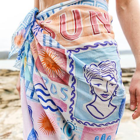 The Santorini Sarong is printed on a lightweight cotton viole which is light and soft. The design is bright and vibrant. The Santorini Sarong is a perfect addition to all your beach and resort wear needs. It can be worn in so many ways: As a full length, midi or mini sarong or even folded into a triangle and worn as a top. The sarong can be tied at a maximum of 120cms diameter so can accommodate a variety of body shapes and sizes. Designed in Australia by Jemima Kingston. 140cm x 140cm100% Cotto Fashion Model Sketch, Beach Ware, Conversational Prints, Model Sketch, Island Vibes, Whimsical Illustration, Sarong, 5th Birthday, Fashion Model