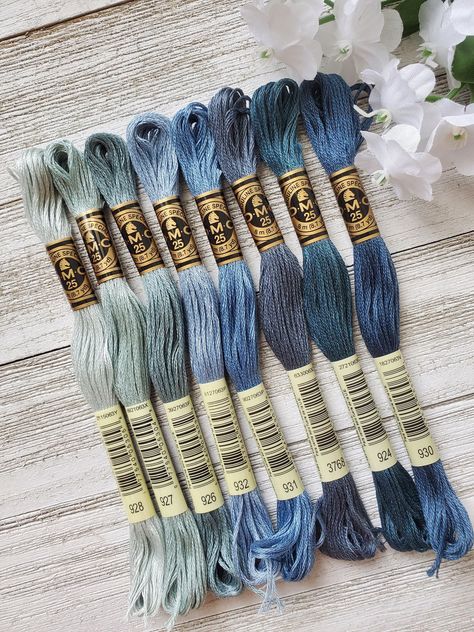 ❤ PRODUCT DETAILS ❤ DMC Set of Flosses- 8 Skeins DMC Art. 117 8 cotton skeins to inspire your next project.  Each skein measures (8m/8.7yds each) Made in France  IF WE ARE MISSING 1 SKEIN FROM THE ABOVE LIST WE WILL SEND THE CLOSEST COLOR. IF MORE THAN 1 IS MISSING YOU WILL BE CONTACTED Colors included:  924 Very Dark Green Gray 926  Medium Green Gray 927 Light Beige Gray 928 Very Light Beige Brown 930 Medium Antique Blue  931 Medium Antique Blue 932 Ultra Very Light Antique Blue 3768 Dark Beige Dmc Floss Chart Color Palettes, Dmc Color Palette Embroidery, Dmc Floss Chart, Embroidery Floss Crafts, Yarn Color Combinations, Cross Stitch Floss, Dmc Embroidery, Cross Stitch Thread, Friendship Bracelets Designs