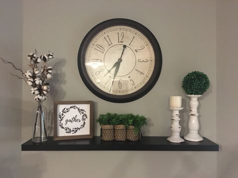 Wall Clock Decor Dining Room, Clock On Shelf Decor, Clock Shelf Wall Decor, Clock With Shelf Underneath, Clock In Dining Room Wall, Decorate With Clocks Living Rooms, Clock And Shelf Wall Decor, Clock Above Tv, Large Clock Wall Decor Living Rooms