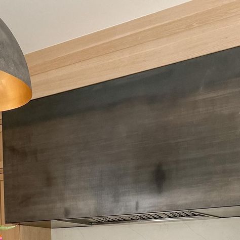 Melissa Liddiard | Intentional Design on Instagram: "One of the most asked questions of all time… What material is our hood? Steel sheet metal! . My husband found the coolest inspiration photo and we shared it with our builder. Then our builder worked hand-in-hand with a local steel company to create this beautiful finish. It definitely has a blue patina. . Make sure you check out stories today, I’m going to be sharing photos of what it looked like before. If you are hoping to replicate the lo Metal Range Hood Kitchen, Metal Kitchen Hood, Melissa Liddiard, Modern Hood, Hood Range, Hood Vent Cover, Metal Range Hood, Steel Company, Kitchen Hood Design