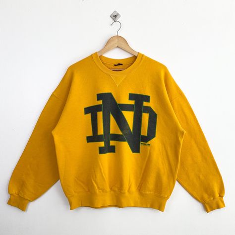 90s NCAA University of Notre Dame ‘Fighting Irish’ Crewneck Sweatshirt Print Logo Yellow Color Men’s L by OzzyVintageShop on Etsy Sweatshirt Print, University Of Notre Dame, Logo Yellow, Sweatshirt Embroidery, Notre Dame University, College Sweatshirt, Embroidery Sweatshirt, Fedex Express, Print Logo