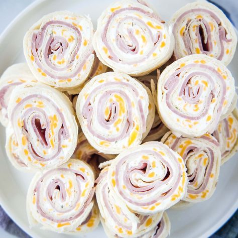 Ham and Cheese Roll Ups Ham And Cheddar Roll Ups, Pinwheel Appetizers Ham And Cheese, Olive Pinwheels, Ham And Cheese Rollups, Fall Chex Mix Recipes, Mexican Cheese Dip, Tortilla Pinwheels Recipe, Cheese Sausage Balls, Cheese Roll Ups