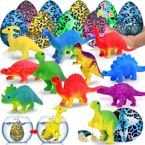 PRICES MAY VARY. 【12 Pcs Easter Hatching Dinosaur Eggs】Set of 12 jumbo dinosaur hatching eggs in a gift box(The Dinosaur Comes in Random Styles).Come with 2 styles, colorful crack, black crack.Each dinosaur egg is equipped with an instruction card. 【Funny Sizes】Easter dinosaur eggs toys, each size is 2.4*1.8 inch (height*width). surprise toys can hatch different styles of dinosaurs in water.Children will get surprises and pleasure at Easter eggs hunt games. 【Easy to Grow and Hatch】Includes instr Egg Dinosaur, Fizzing Dinosaur Eggs, Fizzy Dinosaur Eggs, Dinosaur Nest With Eggs, Dinosaur Egg Decor, Easter Egg Hunt Games, Hatching Dinosaur Egg, Egg Fillers, Easter Egg Fillers