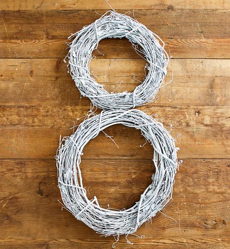 How to Make a Snowman Wreath for Your Front Door | Better Homes & Gardens White Grapevine Wreath, Wreath Snowman, Book Page Wreath, Christmas Village Sets, Make A Snowman, Grapevine Wreaths, Swag Wreath, Diy Snowman, Christmas Wreaths To Make