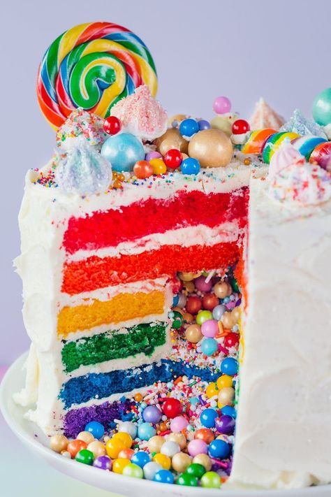 How To Make the Ultimate Rainbow Surprise Cake. Maybe you've seen cakes like this on Pinterest, your favorite baker's Instagram feed, or even IRL at your best friend's house and thought to yourself, "That cake looks so fun and complicated; I could never make that." I'm here to encourage you otherwise! You can totally make this knock-out, show-stopping surprise-inside rainbow layer cake from scratch. Piniata Cake, Swirl Cakes, Surprise Inside Cake, Rainbow Cake Recipe, Cake Flavours, Rainbow Layer Cakes, Nursing Cake, Inside Cake, Popcorn Balls