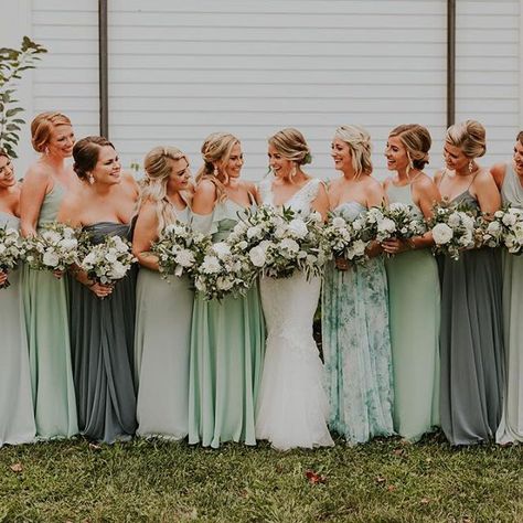 Bridesmaids wearing shades of green for a spring wedding #SpringWedding #BridesmaidsStyle #BridesmaidsInspo #Regram via @Bvyu56yBbDL Different Shades Of Sage Bridesmaids, Various Shades Of Green Bridesmaid Dresses, Blue And Green Mixed Bridesmaid Dresses, Sage Green Bridesmaid Dresses With Wildflowers, Sage Green Bridesmaid Dresses Colorful Flowers, Mismatched Green Bridesmaid Dresses, Bridesmaid Dresses Different Colors, Spring Bridesmaid Dresses, Sage Bridesmaid Dresses