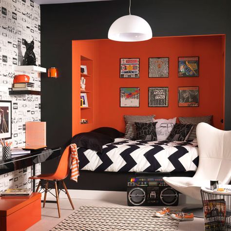 Black and white bedroom with orange feature wall | How to decorate with orange | Colour | PHOTO GALLERY | Housetohome.co.uk Rock N Roll Bedroom, Sleeping Nook, Teenager Bedroom Boy, Teenage Boy Room, Orange Rooms, Boy Bedroom Design, Teenage Room, Teen Boy Bedroom, Bedroom Orange