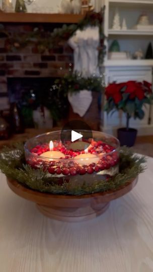 84K views · 6.2K reactions | ✨Christmas Centerpiece✨comment SHOP and I will send you the 🔗 to the supplies for this easy Christmas DIY!

I found this wooden bowl and added a green fern placemat to it then added a clear bowl on top with cranberries, a little iridescent snow and topped it off with some floating candles. It is the perfect holiday centerpiece and looks so pretty on my coffee table in my sitting room/office.
•
•
•
#christmasdecor #christmasdecorations #christmasdiy #christmascenterpiece #christmasdecorideas #christmasideas #holidaydecor #holidaycenterpiece #christmascottage #christmasmood #deckthehalls #tistheseason #theeverygirlathome #seasonaldecor | Ashley Savage | Creator | Atlanta, GA | Mike Block · Dance of the Sugar Plum Fairy Sitting Room Office, Cranberry Candles, Christmas Candles Diy, Candle Table Decorations, Christmas Crafty, Christmas Preparation, Christmas Hacks, Easy Christmas Decorations, Sugar Plum Fairy