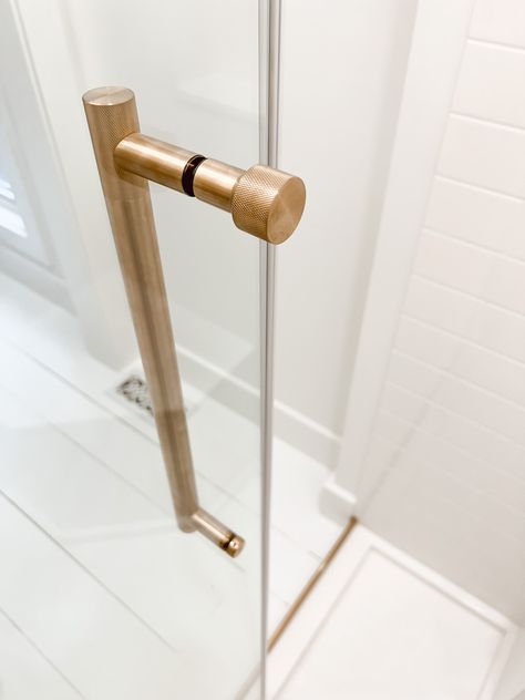 Frameless Glass Shower Door, Shower Door Handles Hardware, Shower Door Options, Shower Door Ideas, Gold Shower Door, Gold Shower Fixtures, Brass Shower Door, Sliding Glass Shower Door, Bronze Shower Door