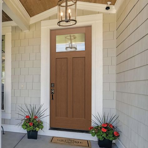 Are you drawn to the clean lines, minimalist aesthetic, and versatility of the “Shaker” style? So are we! Doors from our Craftsman series offer Shaker profiles in Fir and Smooth skins for homeowners who love this timeless style. Check them out! Exterior Doors Craftsman, Natural Wood Front Door Farmhouse, Craftsman Exterior Doors, Shaker Style Exterior Door, Craftsman Doors Exterior Front Entry, Shaker Style Front Door, Front Entry Doors With Sidelights, Shaker Front Door, Exterior Kitchen Doors