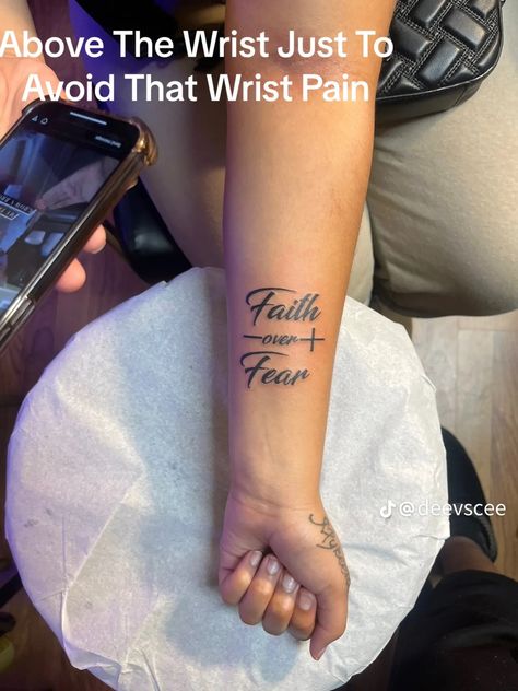 Tattoo Ideas Poetry, God Is Within Her She Will Not Fail Tat Arm, Female Bible Verse Tattoos, Word Forearm Tattoos For Women, Faith Arm Tattoos For Women, Godly Tattoos For Women Half Sleeves, Meaningful Arm Tattoos For Women Forearm, Wrist Tattoo Black Women, First Tattoo Ideas For Women Forearm