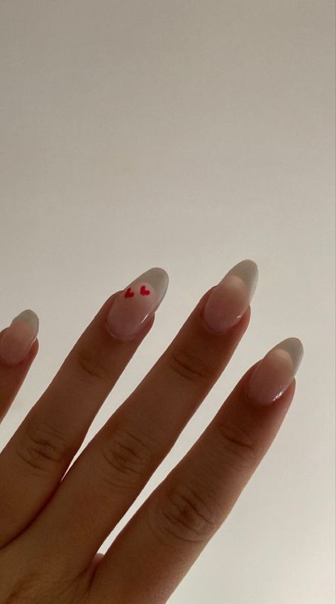 Oval French Tip Nails Valentines, Nails Inspiration French Tip Color, Nail French Tip With Heart, Heart French Nail, Black Tips With Heart Nails, Nails Heart Design Aesthetic, French Tips Love Heart, Valentines Nails Designs French Tips, French Almond Nails With Heart