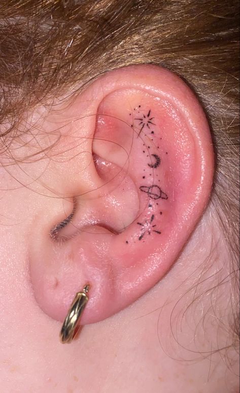 Galaxy tattoo on my ear. Fineline. Tiny. Dainty Constellation Ear Tattoo, Ear Tattoo Constellation, Galaxy Ear Tattoo, Taurus Constellation Tattoo Behind Ear, Fine Line Galaxy Tattoo, Inner Ear Star Tattoo, Galaxy Tattoo, Ear Tattoo, Cute Tattoos