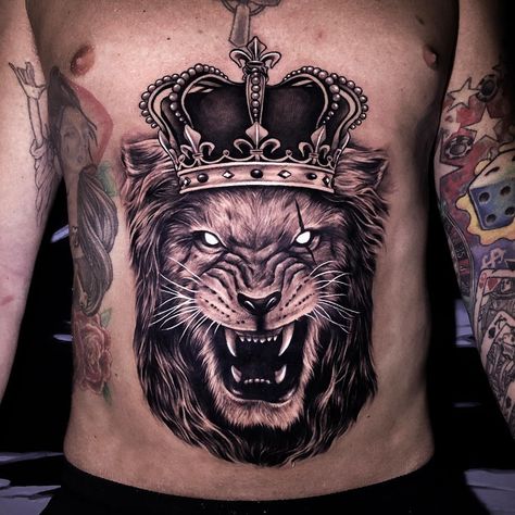 Leo Lion Tattoo with Crown | Tattoo Ideas and Inspiration Crown Tattoo Ideas, Leo Lion Tattoos, Lion Tattoo On Finger, Lion Back Tattoo, Roaring Lion Tattoo, Female Lion Tattoo, Lion With Crown, Small Lion Tattoo, Lion Tattoo Sleeves