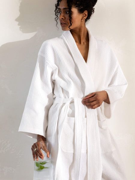 Our plush pure-cotton robes will cocoon you in comfort. Featuring a shawl collar, patch pockets and designed as a longer line silhouette, this luxury spa-like waffle robe is lightweight, absorbent and fast drying. 100% cotton waffle robe, white Length of back to hem 122cm Unisex - one size Bath Robe White, White Waffle Robe, White Bath Robe, Cute Robes For Women, Bath Robe Aesthetics, Bathrobe Photoshoot, Bath Outfit, Bathrobe Aesthetic, Spa Clothes