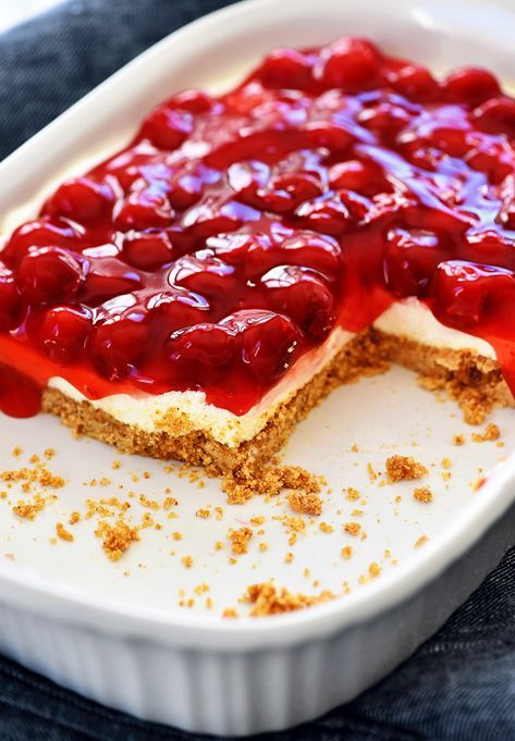 Cherry Delight is an easy dessert recipe with a graham cracker crust, a cheesecake center and topped off with delicious cherry pie filling! Oreo Desert, Simple Deserts, Fried Ice Cream Dessert, Cherry Delight Dessert, Easy Cherry Cobbler, Water Cornbread, Shepherd Pie, Fancy Foods, Sweet Cherry Pie