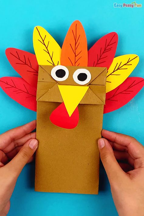 Create a fun and festive Paper Bag Turkey Craft that's perfect for Thanksgiving crafts for kids! This easy and creative project uses a simple paper bag to bring a turkey to life, making it a great addition to your holiday decor. A wonderful way to engage kids with animal crafts for kids and celebrate the season with paper bag crafts! Brown Paper Bag Turkey, Paper Bag Turkey Craft, Turkey Paper Bag, Paper Bag Turkey, Craft For Thanksgiving, Adapted Art, Monster Craft, Paper Bag Crafts, Paper Bag Puppets