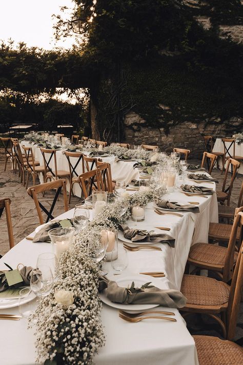 Winding reception tables covered in white tablecloths complete with babys breath table runner and fabric napkins Outdoor Table Decor Wedding, White Wedding Decor Outdoor, Wedding Table Covers, Wedding Table Covers Ideas Tablecloths, Wedding Table With White Tablecloth, Decor Table Wedding, Weding Table, Brown Tablecloth Wedding, Banquette Table Wedding