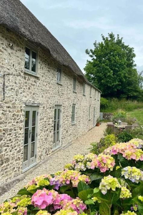 Hardwick White on exterior trim of stone English cottage - @cottage_renovation_somerset. #hardwickwhite English Cottage Exterior Paint Colors, Cottage Windows Exterior, Stone Cottage Exterior, English Farmhouse Exterior, Farmhouse Lounge, English Cottage Exterior, Hardwick White, Georgian Farmhouse, Grey Painted Walls