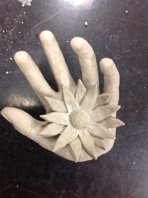 Hand sculpted ceramic hand. High School Ceramics 2. Clay Sculpture Ideas, Hand Art Projects, High School Ceramics, Ceramic Arts Daily, Clay Lesson, High School Art Projects, Pottery Store, Ceramic Art Sculpture, Advanced Ceramics