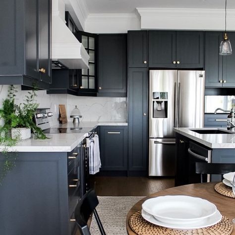 A lot is happening in the kitchen, and painting your wall with a dark color may become overwhelming; hence, a better way to use Cheating Heart is on your cabinet. Bm Cheating Heart, Navy White Kitchen, Timy Houses, Chantilly Lace Benjamin Moore, Gray Kitchens, Open Kitchens, Log Home Kitchens, Bold Kitchen, Paint Store