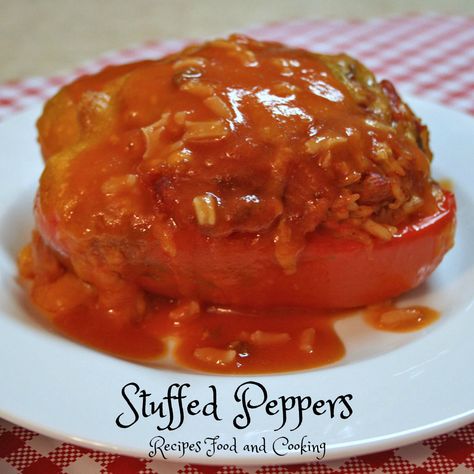 Stuffed Peppers filled with my mom's Spanish rice and topped with cheese and tomato sauce. Stuffed Peppers With Red Sauce, Stuffed Peppers With Tomato Soup, Stuffed Bell Peppers Campbells Tomato Soup, Stuffed Peppers With Tomato Sauce, Stuffed Peppers With Sauce, Spanish Rice Stuffed Peppers, Sauce For Stuffed Peppers, Hamburger Dinners, Stuffed Recipes