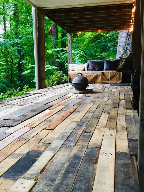 My husband disassembled whole pallets and used the planks to build a flat sitting area in our sloped backyard. Wood Platform Deck Patio, Pallet Porch Deck, Pallet Roof, Pallet Wood Porch, Pallet Decks, Outside Gazebo, Pallet Porch, Pallet Deck, Jean Ideas