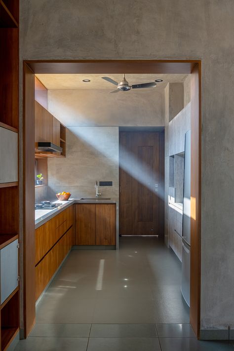 A minimalist, Vastu-compliant Vadodara home crafted to interact with light and nature | Architectural Digest India Kota Stone Flooring, Chettinad House, Wooden Wall Design, Bedroom Pop Design, Kitchen Layout Plans, Courtyard House Plans, Compact House, Courtyard Design, Bungalow House Design