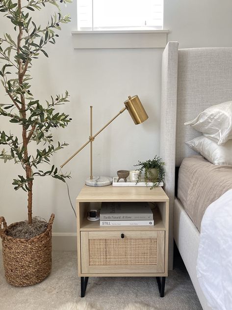 Tan Bedside Table, Bedroom Side Tables Ideas, Rattan Nightstand Bedroom Ideas, Neutral Bedroom Bedside Table, Rattan Bedside Table Styling, Light Wood Nightstand Bedside Tables, Night Stand Organization Ideas, Nightstand Styling Bedside Tables, Rattan Nightstand Bedroom