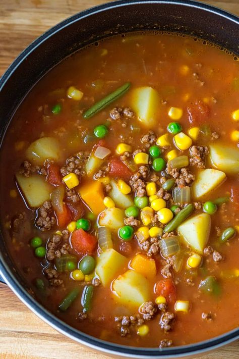 Warm up with a bowl of comforting tomato soup with hamburger meat. This hearty and flavorful dish is perfect for a cozy night in or a special family dinner. Packed with tender beef, juicy tomatoes, and fragrant spices, this savory soup will surely satisfy your taste buds. Try this delicious recipe today and enjoy the delicious combination of rich flavors in every spoonful! Soup With Hamburger Meat, Beefy Tomato Soup Recipe, Soup With Hamburger, Delicious Tomato Soup, Tomato Soup Easy, Tomato Soup Homemade, Canned Tomato Soup, Hamburger Soup, Tomato Soup Recipes