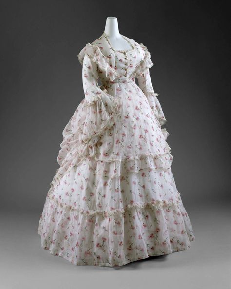 The 1870s was a period of marked romanticism and whimsy in fashionable dress. Much like the picturesque paintings of Renoir that depict such confectionary creations, both day and evening gowns were highly ornamented and often executed in delicate, feminine textiles Museum Nyc, 1870s Fashion, Antique Photography, Historic Fashion, Bustle Dress, French Dress, Afternoon Dress, 19th Century Fashion, Old Dresses