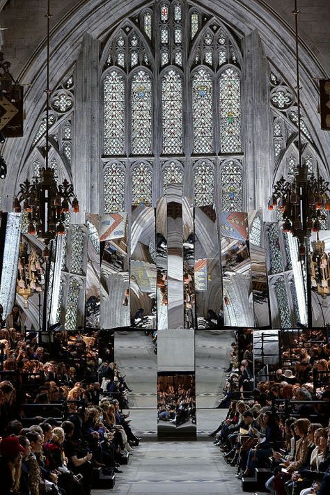 This church setting is proof that Mulberry is religious about achieving good aesthetic. The stunning cathedral, with its intricately stained windows reflected in precisely situated mirrors, was an incredible setting for the brand's show during London Fashion Week. Note: Gothic touches and colored glass make for divine decor. Fashion Show Runway Stage, Fashion Show Set Design, Fashion Show Stage Design, Fashion Show Design, Catwalk Design, Fashion Show Makeup, Fashion Show Party, Fashion Show Themes, Fashion Show Invitation