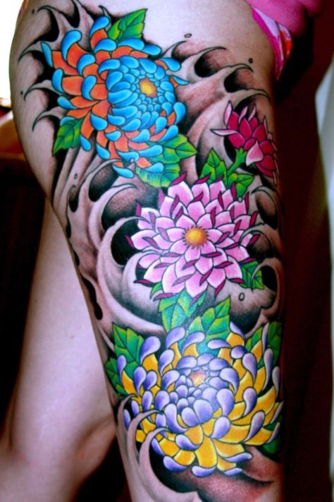 Japanese style leg tattoo. Awesome color! Pick a flower for inside of right bicep Men Flower Tattoo, Hawaiian Tattoos, Peony Flower Tattoos, Fleurs Art Nouveau, Backpiece Tattoo, Japanese Flower Tattoo, Chrysanthemum Tattoo, Hawaiian Tattoo, Japanese Flower