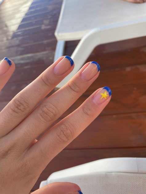 Blue french tip nails with gold / yellow star detail Nail Blue And Yellow, Blue And Yellow Nails Short, Red Blue And Yellow Nails, Blue And Yellow Star Nails, Yellow Star Nails, Nails Blue And Yellow, Yellow Blue Nails, Nail Inspo Yellow, Blue Yellow Nails