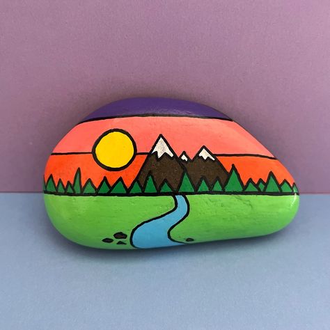 1 of 1! 🤩 Hand painted acrylic rock painting, on natural beach pebble! ⛰️🏔️ Sealed with varnish 🎨 Hand signed on back ✍️ (Colours may vary slightly) Beach Rock Art Ocean, Smile Rock Painting, Painting Mountains On Rocks, Rectangle Rock Painting Ideas, Scenery Rock Painting, Art Rocks Painting, Nature Rock Painting Ideas, Hand Painted Stepping Stones, Nature Rock Painting