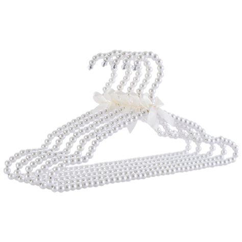 PRICES MAY VARY. Size: 16 Inches width. Pearl hangers is luxury,top quality white pearl beads and bow design adds a touch of elegance. These special hangers with smooth plastic pearl covering and plastic beads make them the perfect choice for delicate bridal, bridesmaid dresses, and other precious garments. These hangers are personalized, preventing discolouration, and gentle on fabrics. The special metal hangers with luxury top-quality beads embellished are one of the best hangers for clothes, Pearl Hangers, Bow Clothes, Pearl Hanger, Best Hangers, Clothing Hangers, Fabric Hanger, Bridesmaid Hangers, Bride Wedding Dress, Wedding Dress Hanger