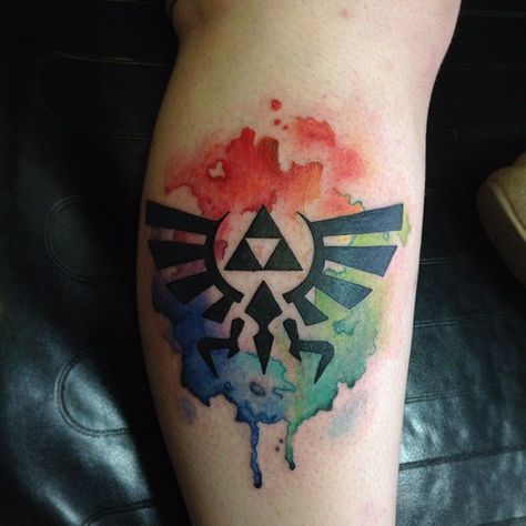 Pin for Later: Prepare to Geek Out Over These Tattoo Ideas Hylian Crest Nintendo Tattoo, Game Tattoo, Video Game Tattoos, Zelda Tattoo, Gamer Tattoos, Video Game Tattoo, Sibling Tattoos, Gaming Tattoo, Link Zelda