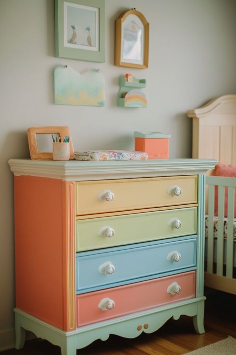 colorful dresser for rainbow themed nursery Rainbow Themed Playroom, Pastel Girl Nursery, Girl Nursery Ideas Colorful, Nursery Ideas Unique, Colorful Girl Nursery, Rainbow Nursery Ideas, Colorful Baby Room, Painted Nursery Furniture, Whimsical Playroom