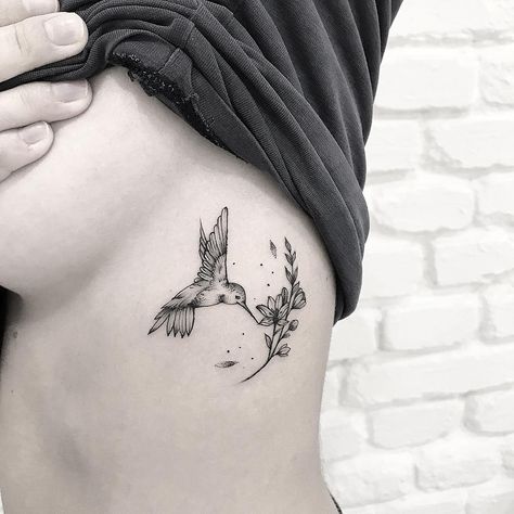 Hummingbird Wrist Tattoo, Hummingbird Tattoo With Flowers, Hummingbird Tattoo Black, Hummingbird Flower Tattoos, Bird Tattoo Ribs, Flower Hip Tattoos, Hummingbird Tattoos, Flower Tattoo On Ribs, Bird Tattoos For Women