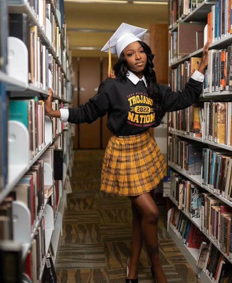 Varsity Jacket Graduation Pictures, Senior Picture Ideas Black Women Outside, Library Photo Shoot Graduation, Graduation Library Photoshoot, Artsy Graduation Photos, College Photoshoot Ideas, Library Graduation Pictures, Lsu Graduation Pictures, School Photoshoot Ideas