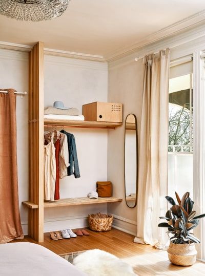 6 Decor Tricks Hiding at Dreamers Welcome in Wilmington Solution For No Closet In Bedroom, Open Closet Guest Room, Open Space Above Closet, Clothes Racks Bedroom, Closet For Small Spaces, Cobalt Blue Bedrooms, Hotel Closet, Exposed Closet, Organization Ideas Closet