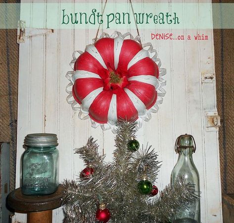 I always seem to have an extra bundt pan. I pick them up at the thrift store all the time. I turned this one into a candy cane striped wreath with a poinsettia in the middle and scalloped ribbon on the edges. Bundt Pans, Mesh Wreath Tutorial, Easy Diy Wreaths, Unique Decorations, Candy Cane Wreath, Candy Cane Stripes, Bundt Pan, Mantle Decor, Dollar Store Crafts