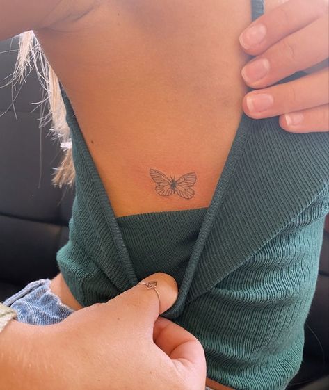 Ribcage Tattoo Butterfly, Fine Line Butterfly Tattoo Rib, Ribs Butterfly Tattoo, Butterfly Tattoos On Ribs, Butterfly Ribs Tattoo, Butterfly Tattoo On Rib Cage, Butterfly Between Breast Tattoo, Butterfly On Ribs Tattoo, Butterfly Rib Tattoos For Women