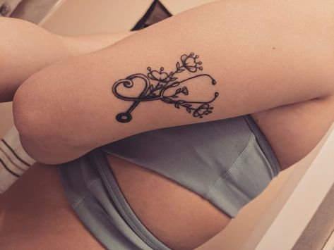 Pediatric Nursing Tattoos, Nurse Stethoscope Tattoo, Stethoscope With Flowers Tattoo, Stethescope Tattoo Simple, Nurse Flower Tattoo, Floral Stethoscope Tattoo, Medical Field Tattoo Ideas, Pediatric Nurse Tattoo, Cna Tattoos For Women