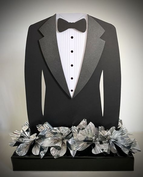 Foamcore tux with layers for a party centerpiece. Tuxedo Theme Party Centerpieces, Bow Tie Centerpieces For Men, Tuxedo Backdrop Diy, Centerpieces For A Mans Birthday Party, Tuxedo Theme Birthday Party, Male 60th Birthday Party Centerpieces, Tuxedo Centerpieces For Men, Black Tie Centerpieces, Father's Day Table Decor Ideas