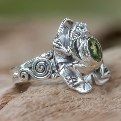 NOVICA Peridot and silver frog cocktail ring ($30) ❤ liked on Polyvore featuring jewelry, rings, cocktail, peridot, silver jewelry, band rings, lily ring, cocktail rings and silver swirl ring Frog Cocktail, Rainforest Frog, Amethyst Cocktail Ring, Paw Print Jewelry, Ribbon Jewelry, Fair Trade Jewelry, Peridot Stone, Printed Jewelry, Peridot Ring