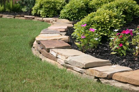 Stacked flagstone borders offer such a lovely mix of color! Flagstone Landscaping Border, Flagstone Border Flower Beds, Stacked Flagstone Edging, Flagstone Border, Flagstone Landscaping, Berm Ideas, Final Valley, Flagstone Garden, Rock Borders