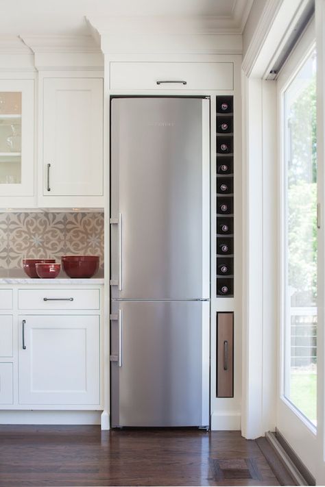 Beautiful kitchen features white shaker cabinetry painted Benjamin Moore White Dove accented with beautiful hand painted tile backsplash! Clever Kitchen Ideas, Small Kitchen Decoration, Kitchen With White Cabinets, Fridge Design, Built In Wine Rack, Kitchen Fridges, Small Kitchen Decor, Smart Kitchen, Trendy Kitchen